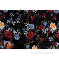 Tissus imprimés à motifs de fleurs variées de couleurs sombres